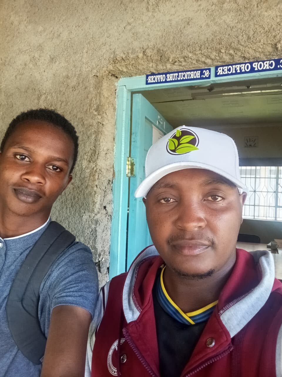 George Ngugi with a Sub-County horticulture officer, field research