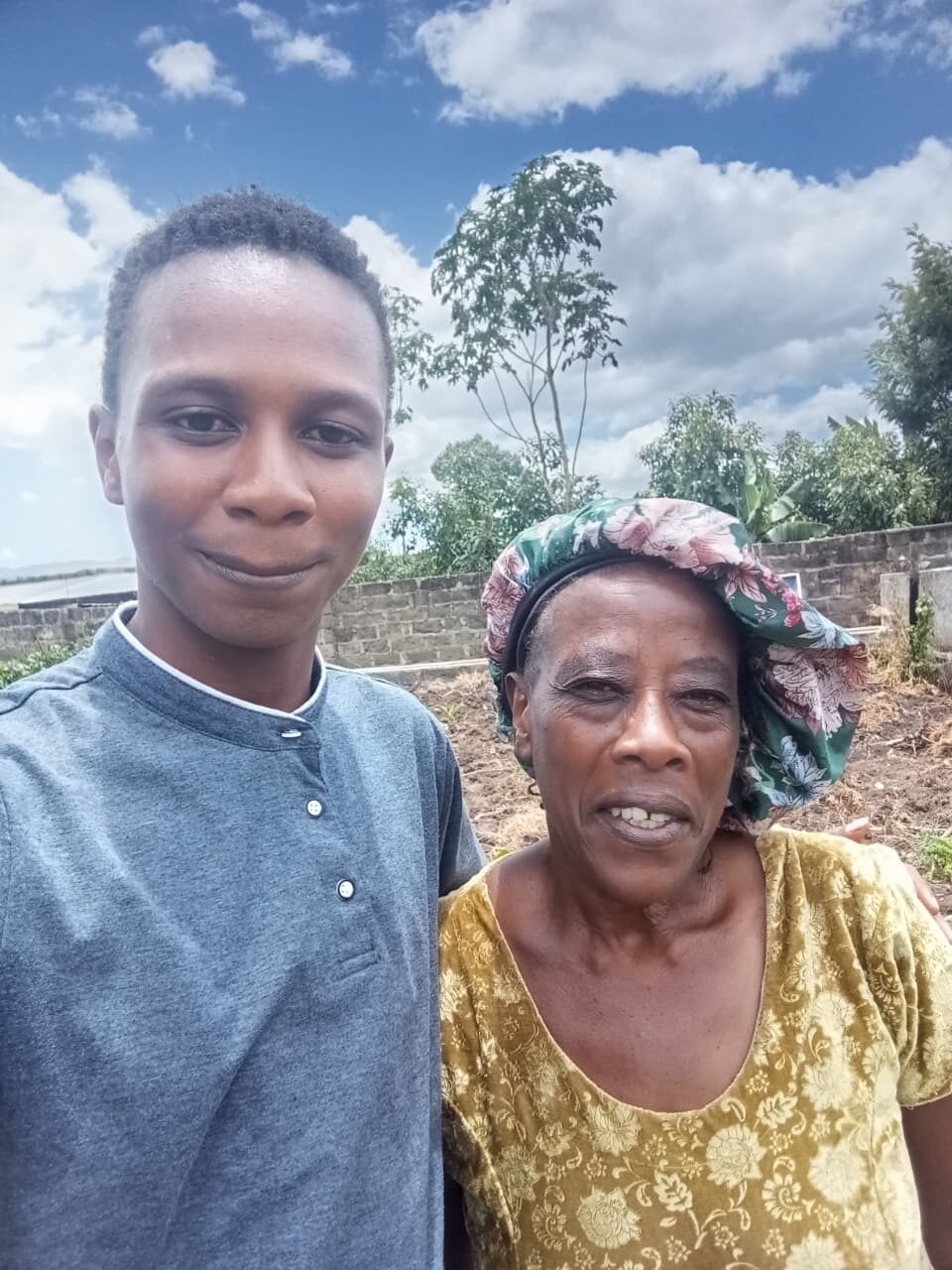 George Ngugi with grower Erah Chomba, Subukia, following her interview and consent for documentation